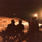 David Lynch and cinematographer Freddie Francis relax for a moment during a night shoot on the Churubusco backlot during the making of Dune (1984)