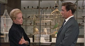 Rod Taylor and Tippi Hedren "meet cute" in the opening scene of Alfred Hitchcock's The Birds (1963)