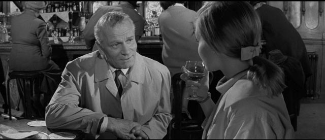 Laurence Olivier as skeptical but sympathetic Superintendent Newhouse