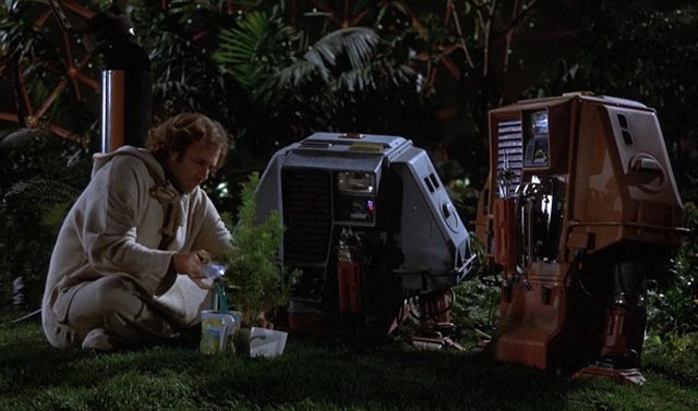 Freeman Lowell (Bruce Dern) with two of the drones in Douglas Trumbull's Silent Running (1972)