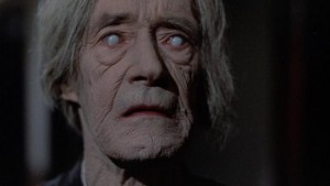 John Carradine as the damned soul guarding the gateway to Hell in Michael Winner's The Sentinel (1977)