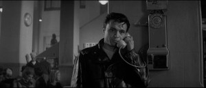 Perry Smith desperately seeking contact before taking the irrevocable step in Richard Brooks' In Cold Blood (1967)