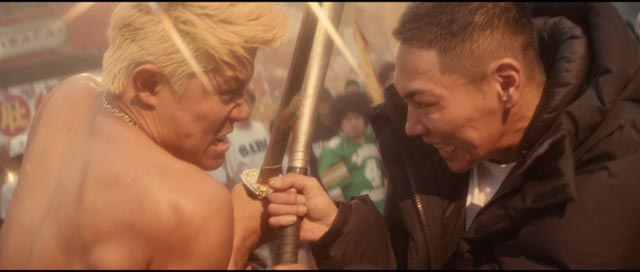 Gang leaders clash in Sion Sono's futuristic hip-hop musical action movie Tokyo Tribe (2014)