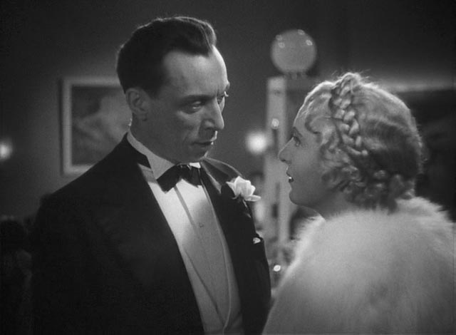 Louis Jouvet as the failed lawyer turned criminal Pierre Verdier with Marie Bell as Christine in Julien Duvivier's Un carnet de bal (1937)