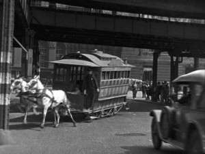 The moment before the crash, a real accident skillfully incorporated into the film's action in Harold Lloyd's Speedy (1928)