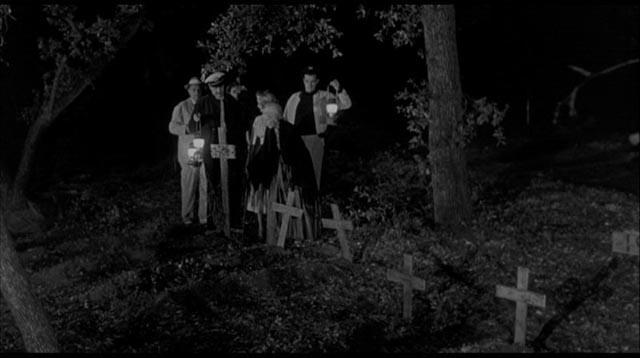 Grandma Peters shows her visitors where they're bound to end up if they keep looking for the cursed jewels in Edward L. Cahn's Zombies of Mora Tau (1957)