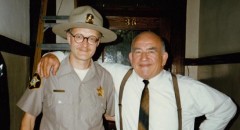 Yes, that's me, the least convincing state trooper ever to appear on screen, hanging out with the very affable Ed Asner on the set of Paul Shapiro's Heads (1994)