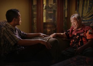 A chilling moment: one of the killers responds by asking for the name of Adi's village in Joshua Oppenheimer's The Look of Silence (2014)
