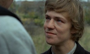 Eddie Axberg as Karl Oskar's younger brother Robert, dreaming of Californian gold fields in Jan Troell's The New Land (1972)