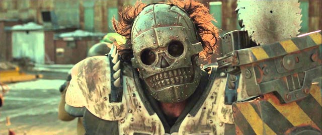 Edwin Wright as Zeus' power saw-wielding henchman Skeletron in Turbo Kid (2015)