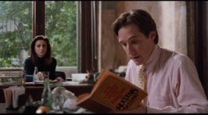 Ted (Taylor Nichols) diligently reads self-help books to improve his salesmanship in Whit Stillman's Barcelona (1994)