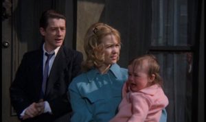 Timothy and Beryl Evans with their baby daughter, taking rooms at 10 Rillington Place in Richard Fleischer's 1971 true-crime movie