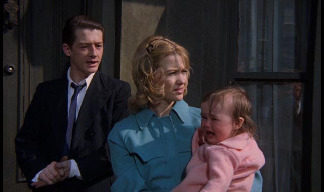 Timothy and Beryl Evans with their baby daughter, taking rooms at 10 Rillington Place in Richard Fleischer's 1971 true-crime movie