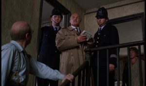 Serial killer John Reginald Christie helps the police in Richard Fleischer's true-crime movie 10 Rillington Place (1971)