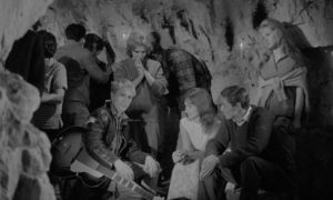 Jenny and her friends, including Adam Faith, party in a cave in Edmond T. Greville's Beat Girl (1959)