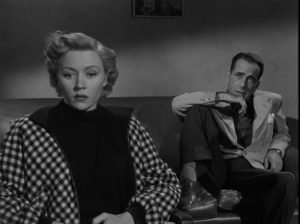 Laurel and Dix meet in Captain Lochner's office where she provides his alibi in Nicholas Ray's In a Lonely Place (1950)