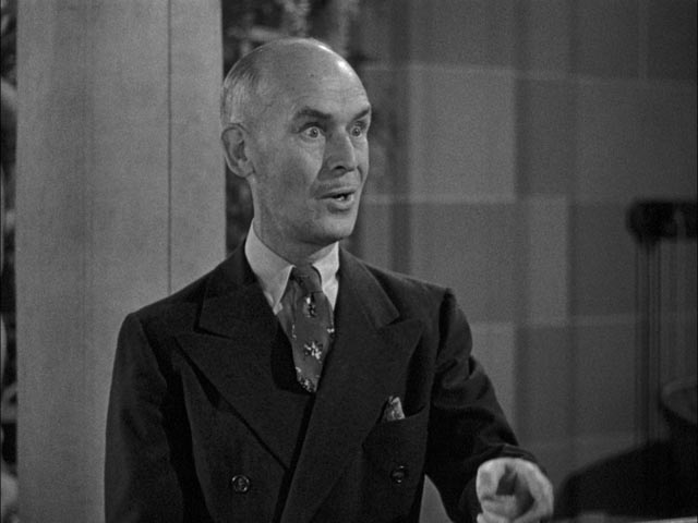 James Gleason as Joe's perplexed manager Max Corkle in Alexander Hall's Here Comes Mr. Jordan (1941)
