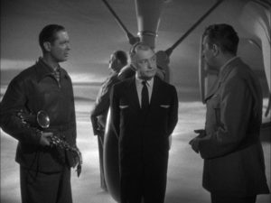 Boxer Joe Pendleton argues with the Heavenly bureaucracy about not being dead in Alexander Hall's Here Comes Mr. Jordan (1941)