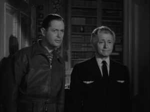 Joe Pendleton (Robert Montgomery) and Mr. Jordan (Claude Rains) in Alexander Hall's Here Comes Mr. Jordan (1941)