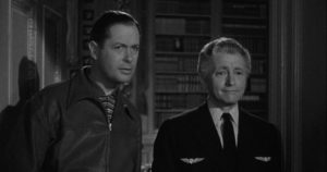 Joe Pendleton (Robert Montgomery) and Mr. Jordan (Claude Rains) in Alexander Hall's Here Comes Mr. Jordan (1941)
