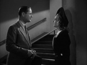 Bette meets boxing champ K.O. Murdoch and finds him strangely familiar in Alexander Hall's Here Comes Mr. Jordan (1941)