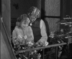 Legrande (Michel Simon) enjoys his illusory idyll with Lulu (Janie Marese) in Jean Renoir's La Chienne (1931)