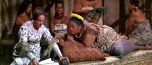 Jerusha (Julie Andrews) teaches Malama Kanakoa (Jocelyne LaGarde) how to write English in George Roy Hill's Hawaii (1966)