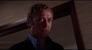 Michael Caine brooding about thriller cliches and a Nazi revival in John Frankenheimer's The Holcroft Covenant (1985)