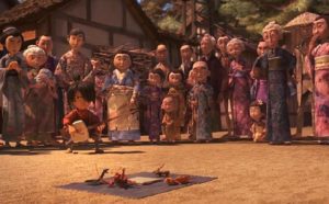 Kubo entertains in the village market by bringing origami to life in Travis Knight's Kubo and the Two Strings (2016)