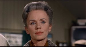 Jessica Tandy as Lydia in Alfred Hitchcock's The Birds (1963), a stern judgemental exterior shielding deep insecurity