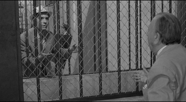 Jose Luis, trapped by his role, pleads with Amadeo to take his place in Luis Garcia Berlanga's The Executioner (1963)