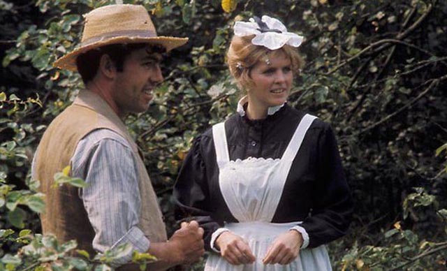 Tom Rouse, the grandfather, courting Charlotte (Lyn Brooks), a maid at the local manor in Peter Hall's film of Ronald Blythe's book Akenfield (1974)
