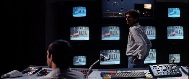 Vincent (Harry Dead Stanton) manipulates TV-mediated reality in Bertrand Tavernier's Death Watch (1980)