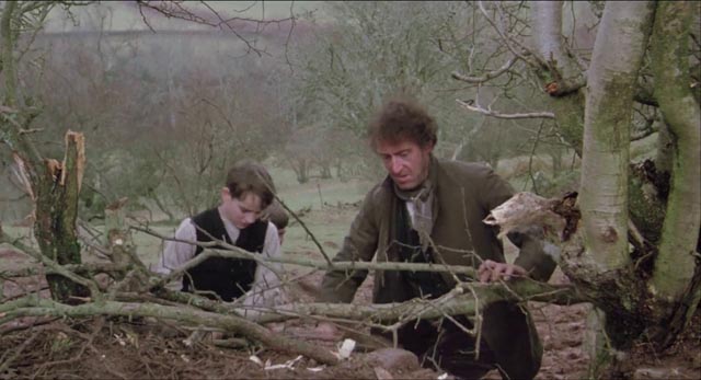 Amos and one of his sons mending a fence damaged by their hostile neighbour in Andrew Grieve's film of Bruce Chatwin's On the Black Hill (1988)