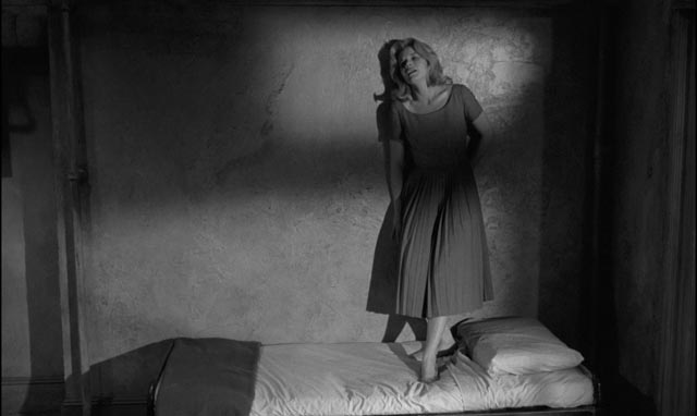 Mary Ann (Carroll Baker) imprisoned by the man who saved her from suicide in Jack Garfein's Something Wild (1961)