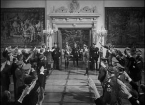 Reichsprotektor Heydrich arrives to berate his underlings in Prague in Fritz Lang's Hangmen Also Die! (1943)