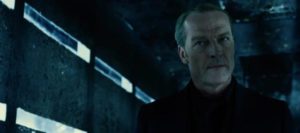 Dr. Isaacs (Iain Glen), architect of the apocalypse in Paul W.S. Anderson's Resident Evil: The Final Chapter (2016)