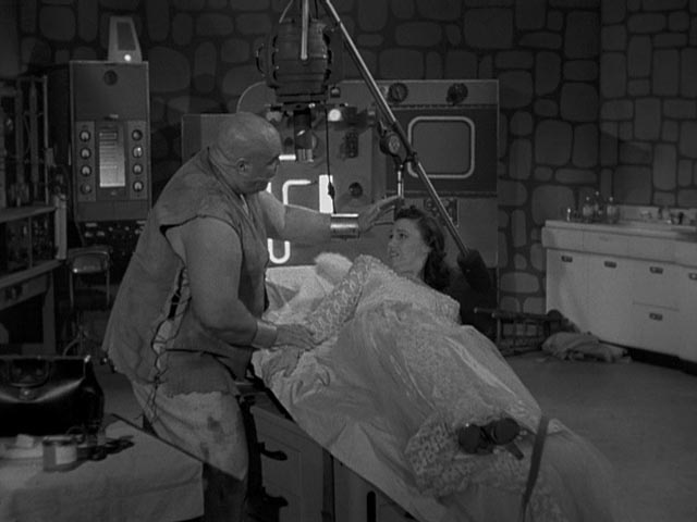 The "bride" (Loretta King) is made uncomfortable by Lobo's expressions of affection in Edward D. Wood Jr's Bride of the Monster (1955)