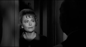 Olivia de Havilland as Charlotte's sweet and concerned cousin Miriam in Robert Aldrich's Hush ... Hush, Sweet Charlotte (1964)