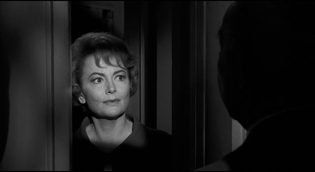 Olivia de Havilland as Charlotte's sweet and concerned cousin Miriam in Robert Aldrich's Hush ... Hush, Sweet Charlotte (1964)