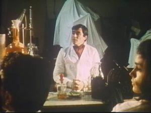 Jekyll lectures his students about the bio-chemical nature of evil in Andy Milligan's The Man With Two Heads (1972)