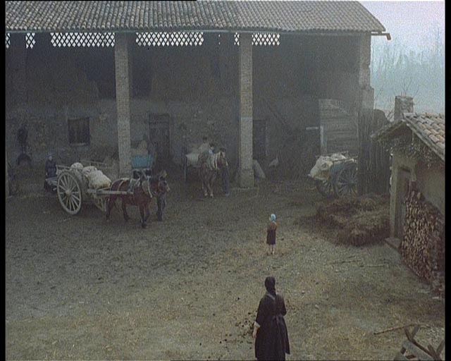 The courtyard of the farmhouse in Ermanno Olmi's The Tree of Wooden Clogs (1978)