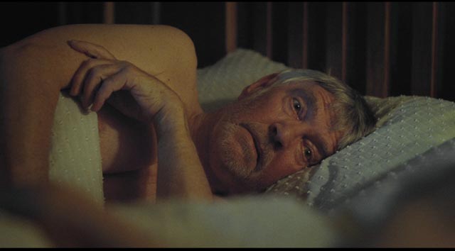 Geoff is haunted by the emotional weight of a past he had suppressed in Andrew Haigh's 45 Years (2015)