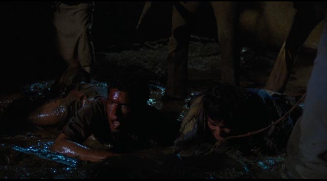 The workers caught inexplicably in a violent nightmare in Felipe Cazals' Canoa: A Shameful Memory (1976)