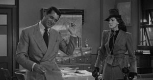 Walter Burks (Cary Grant) tries to railroad ex-wife Hildy Johnson (Rosalind Russell) into staying with the newspaper in Howard Hawks' His Girl Friday (1940)