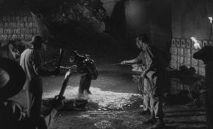 The archaeologists prepare to explore the deep pool inside the cave in Mario Bava & Riccardo Freda's Caltiki: The Immortal Monster (1959)