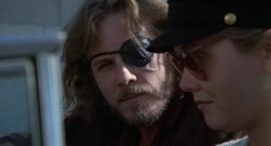 Alex Cutter (John Heard), the embittered Vietnam vet with a money-making plan in Ivan Passer's Cutter's Way (1981)