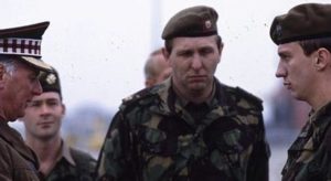 The military authorities are unhappy to see Kevin Deakin (David Thewlis) return alive in Paul Greengrass' Resurrected (1989)