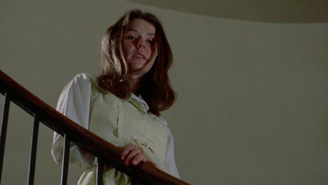 A classic use of the staircase to establish power relations in Frederick R. Friedel's Axe (1974) ...