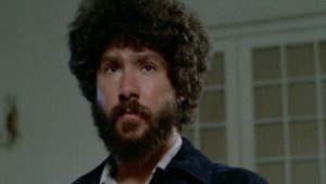 Director Frederick R. Friedel as reluctant gang member Billy in Frederick R. Friedel's Axe (1974)